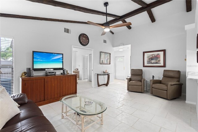 5301 Linksman Pl, North Port, FL 34287 - living area featuring beamed ceiling, a ceiling fan, and high vaulted ceiling