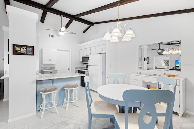5301 Linksman Pl, North Port, FL 34287 - dining room with a chandelier, beamed ceiling, baseboards, high vaulted ceiling, and a ceiling fan