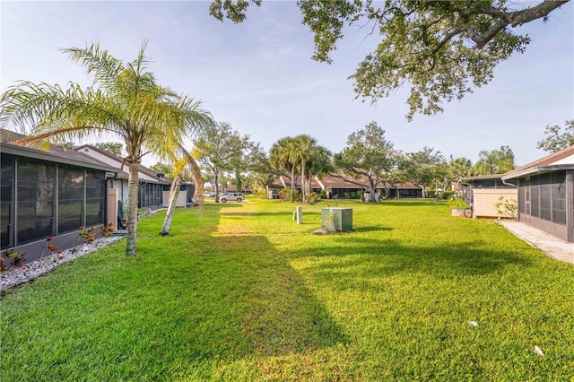 5301 Linksman Pl, North Port, FL 34287 - view of grassy yard featuring a sunroom
