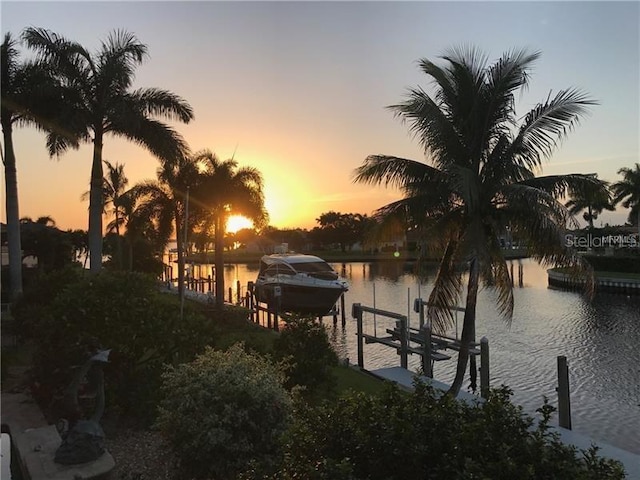 5301 Linksman Pl, North Port, FL 34287 - dock featuring boat lift and a water view