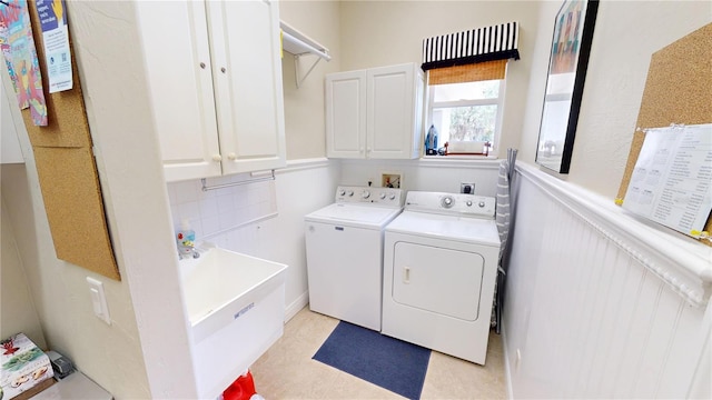 8596 SW Riverside Dr, Arcadia, FL 34269 - washroom with separate washer and dryer and cabinet space
