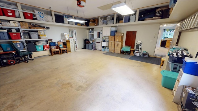 8596 SW Riverside Dr, Arcadia, FL 34269 - garage featuring a garage door opener
