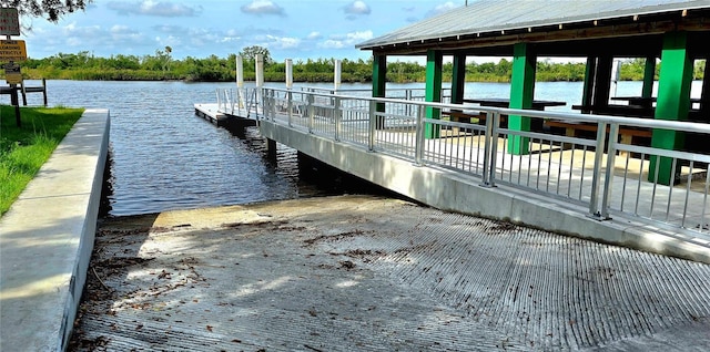 8596 SW Riverside Dr, Arcadia, FL 34269 - dock area featuring a boat ramp and a water view