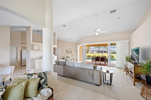 living room featuring ceiling fan, high vaulted ceiling, and light tile patterned flooring