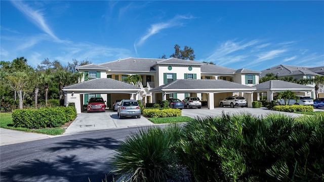 15050 Sandpiper Preserve Blvd Unit 101, Fort Myers, FL 33919 - exterior space with covered parking