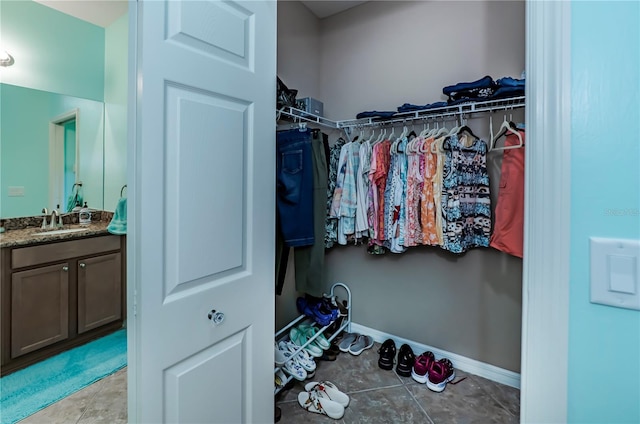 15050 Sandpiper Preserve Blvd Unit 101, Fort Myers, FL 33919 - walk in closet with a sink