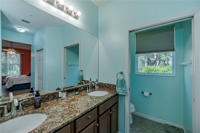 15050 Sandpiper Preserve Blvd Unit 101, Fort Myers, FL 33919 - ensuite bathroom featuring toilet, tile patterned floors, visible vents, and a sink