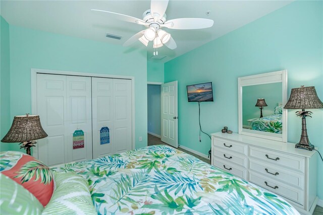 15050 Sandpiper Preserve Blvd Unit 101, Fort Myers, FL 33919 - bedroom featuring carpet, a ceiling fan, a closet, visible vents, and baseboards
