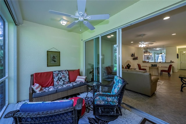 15050 Sandpiper Preserve Blvd Unit 101, Fort Myers, FL 33919 - sunroom / solarium with ceiling fan and outdoor lounge area