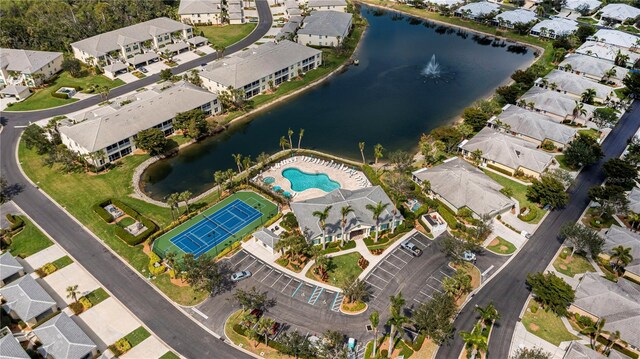15050 Sandpiper Preserve Blvd Unit 101, Fort Myers, FL 33919 - birds eye view of property featuring a water view and a residential view