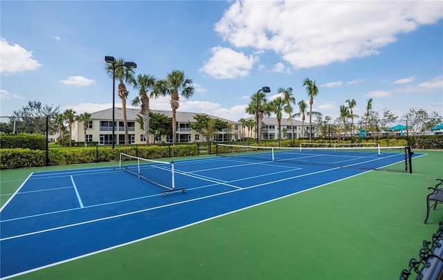 15050 Sandpiper Preserve Blvd Unit 101, Fort Myers, FL 33919 - view of tennis court with community basketball court and fence