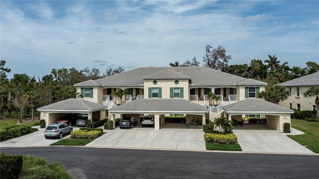 15050 Sandpiper Preserve Blvd Unit 101, Fort Myers, FL 33919 - coastal home with stucco siding and driveway