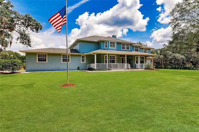 7192 SW Albritton St, Arcadia, FL 34266 - back of house with covered porch and a yard