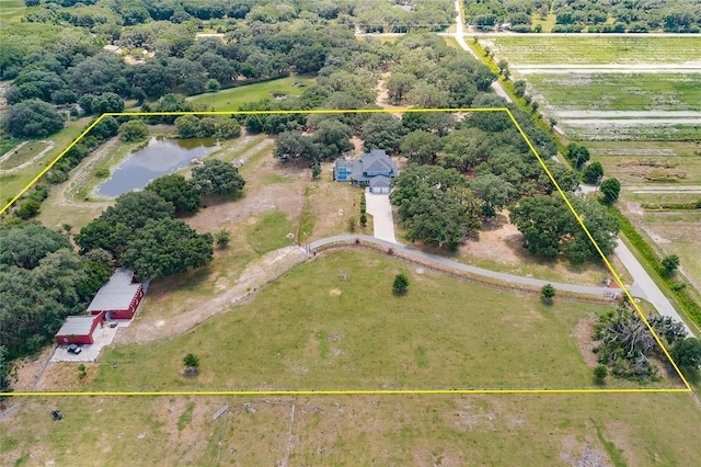 7192 SW Albritton St, Arcadia, FL 34266 - aerial view of sparsely populated area with property parcel outlined and a large body of water
