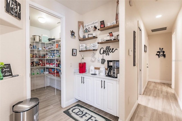 7192 SW Albritton St, Arcadia, FL 34266 - hall with light wood-style floors and baseboards