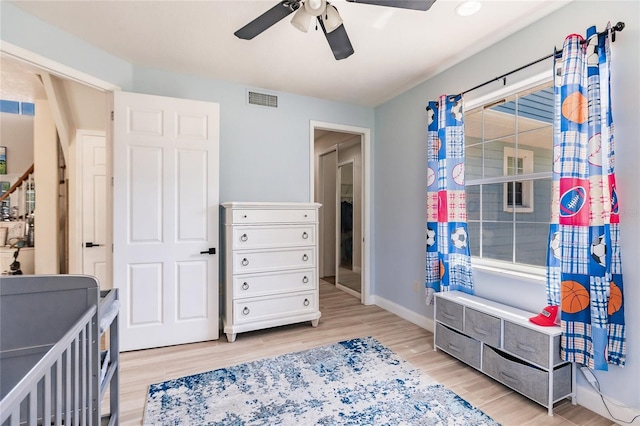 7192 SW Albritton St, Arcadia, FL 34266 - bedroom with light wood-type flooring, baseboards, and ceiling fan