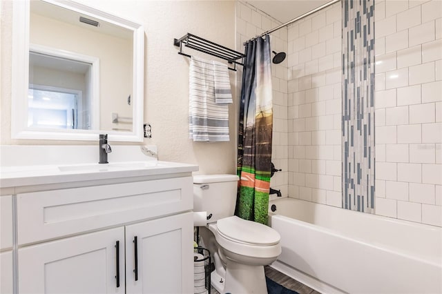 7192 SW Albritton St, Arcadia, FL 34266 - bathroom featuring shower / bath combo with shower curtain, toilet, and vanity
