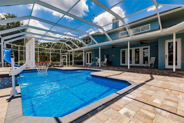 7192 SW Albritton St, Arcadia, FL 34266 - outdoor pool featuring french doors, a patio, a ceiling fan, and glass enclosure