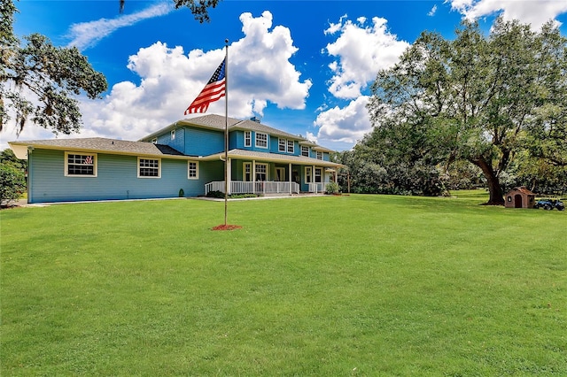 7192 SW Albritton St, Arcadia, FL 34266 - back of property with a lawn and covered porch