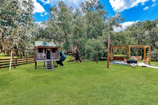 7192 SW Albritton St, Arcadia, FL 34266 - view of yard featuring a pergola, a patio, view of wooded area, and an outdoor hangout area