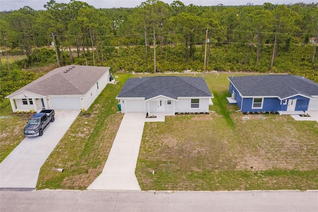 27438 Corinthian Dr, Punta Gorda, FL 33955 - aerial view of property and surrounding area featuring a heavily wooded area
