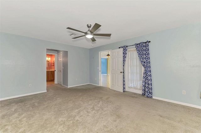 3027 Ridgewood Dr, North Port, FL 34287 - carpeted spare room featuring a ceiling fan and baseboards