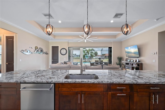 3527 NW 8th Ter, Cape Coral, FL 33993 - kitchen with a raised ceiling, open floor plan, stainless steel dishwasher, light stone countertops, and crown molding