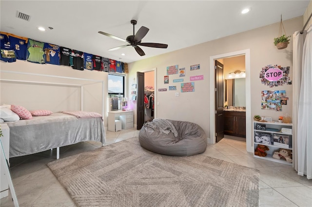 3527 NW 8th Ter, Cape Coral, FL 33993 - bedroom featuring light tile patterned flooring, recessed lighting, ensuite bath, a closet, and a spacious closet