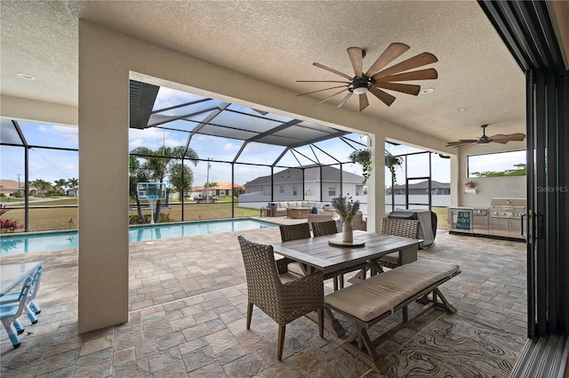 3527 NW 8th Ter, Cape Coral, FL 33993 - view of patio / terrace with a ceiling fan, an outdoor pool, outdoor dining space, glass enclosure, and grilling area