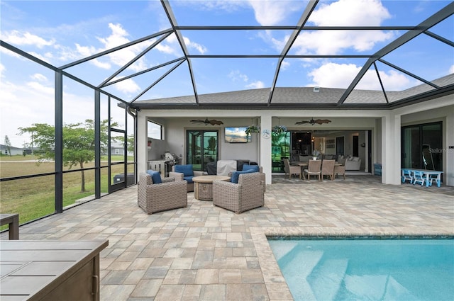 3527 NW 8th Ter, Cape Coral, FL 33993 - outdoor pool featuring a ceiling fan, a patio, glass enclosure, and outdoor lounge area