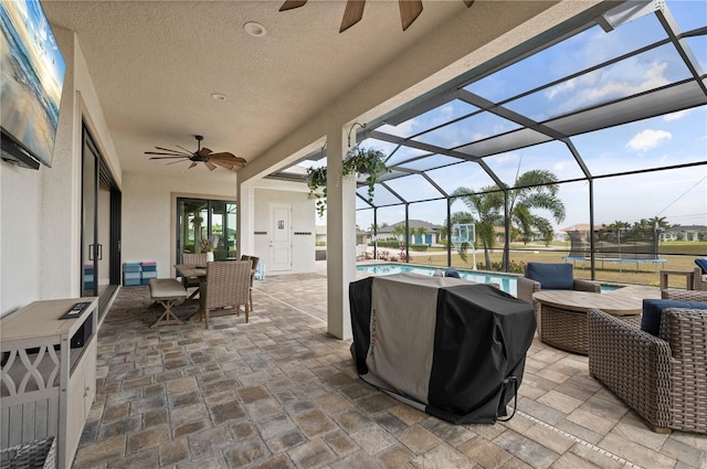 3527 NW 8th Ter, Cape Coral, FL 33993 - view of patio featuring ceiling fan, an outdoor pool, grilling area, an outdoor living space, and glass enclosure