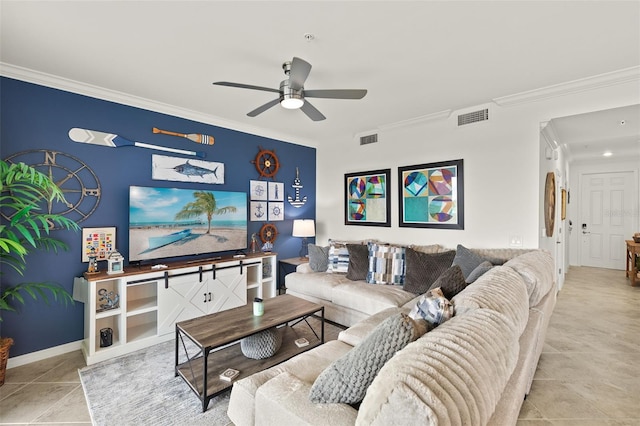living area with crown molding, ceiling fan, tile patterned flooring, and baseboards