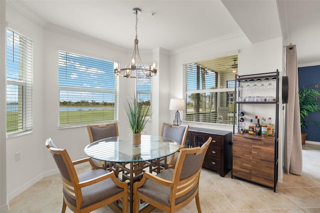dining room featuring a chandelier, light tile patterned flooring, ornamental molding, and baseboards