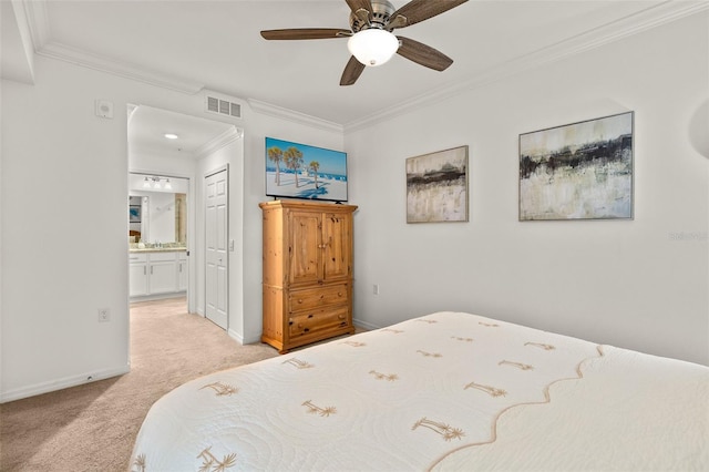 bedroom featuring light carpet, ornamental molding, ensuite bath, baseboards, and a ceiling fan