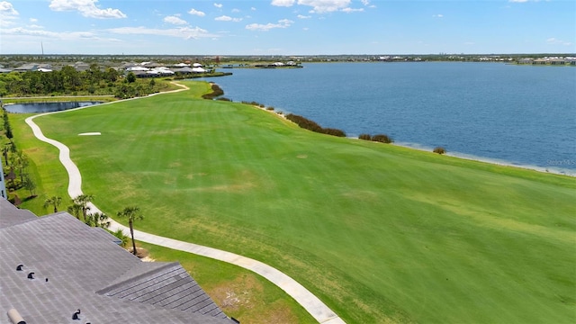 bird's eye view of a golf club and a nearby body of water