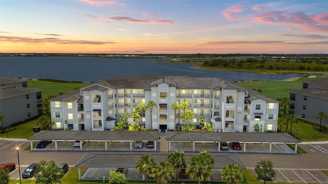 bird's eye view of a nearby body of water and apartment complex