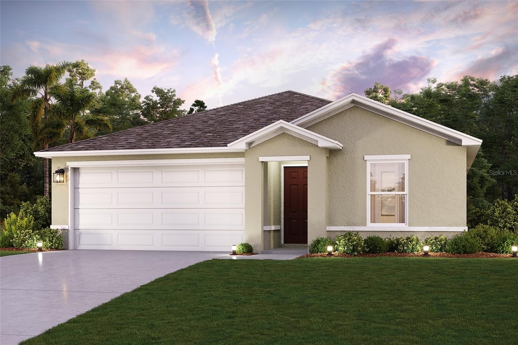 ranch-style house featuring concrete driveway, an attached garage, a front lawn, and stucco siding