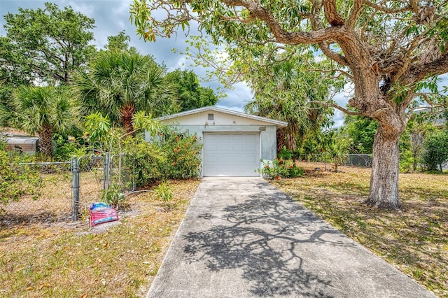 12018 Saragossa Ln, North Port, FL 34287 - detached garage with driveway and fence