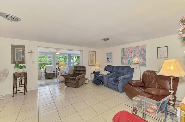 12018 Saragossa Ln, North Port, FL 34287 - living area with light tile patterned flooring and ceiling fan