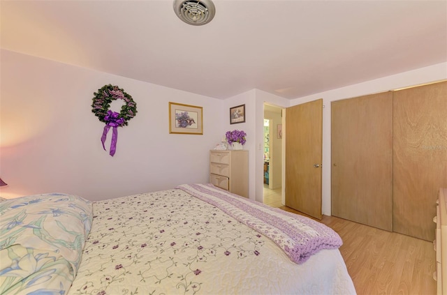 12018 Saragossa Ln, North Port, FL 34287 - bedroom featuring light wood finished floors