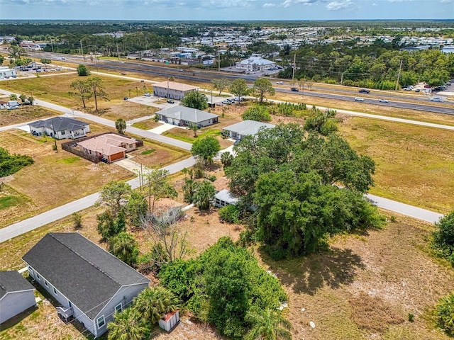 12018 Saragossa Ln, North Port, FL 34287 - aerial view of residential area with a tree filled landscape