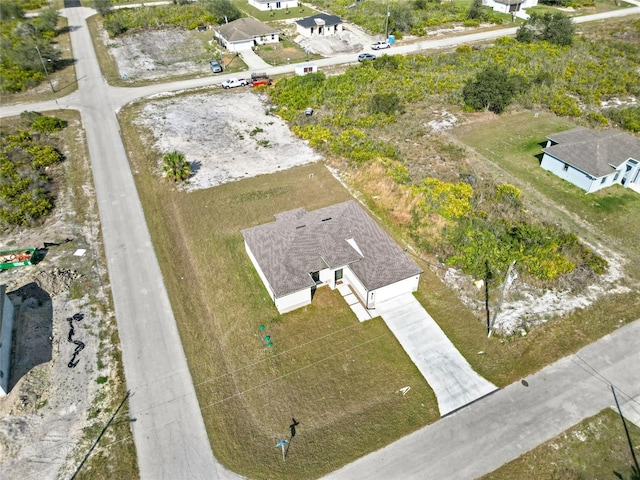 aerial view of property's location featuring nearby suburban area