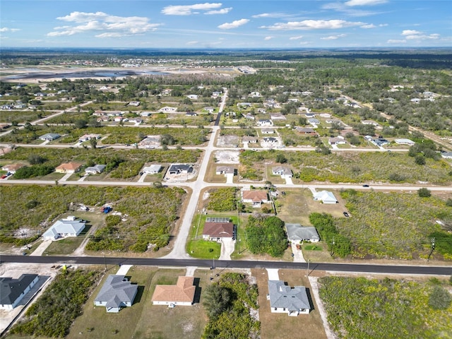 aerial view of property's location featuring nearby suburban area
