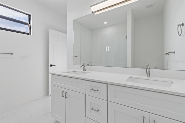 bathroom with marble look tiles, double vanity, a shower, and an AC wall unit