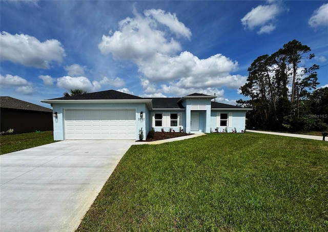 prairie-style house with stucco siding, concrete driveway, an attached garage, and a front yard