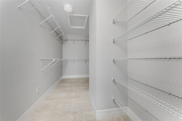 spacious closet with attic access
