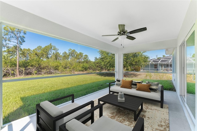 sunroom / solarium with outdoor lounge area and ceiling fan