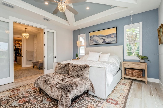 1306 Osprey Dr, Punta Gorda, FL 33950 - bedroom with wood finished floors, multiple windows, baseboards, and recessed lighting