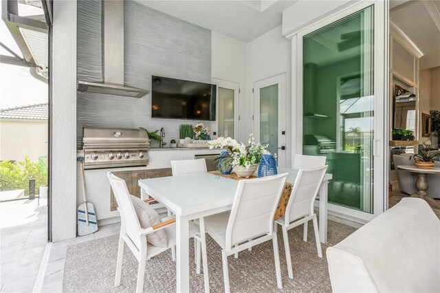 1306 Osprey Dr, Punta Gorda, FL 33950 - view of patio / terrace with outdoor dining space, a grill, and area for grilling