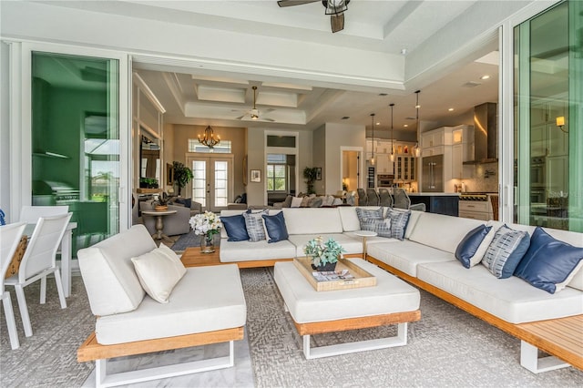 1306 Osprey Dr, Punta Gorda, FL 33950 - living room with a ceiling fan, a raised ceiling, and french doors